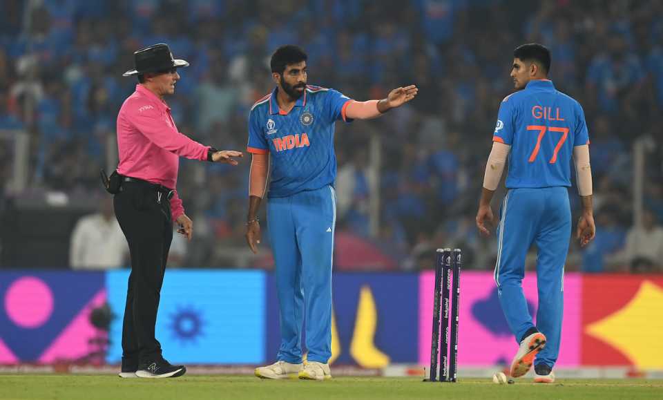 Jasprit Bumrah has a word with Richard Kettleborough