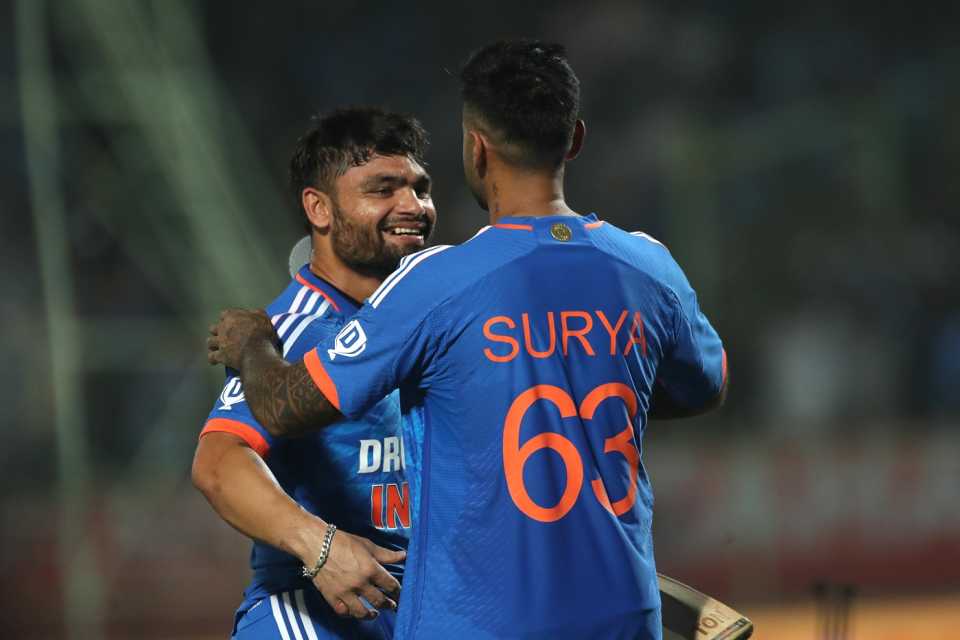 Rinku Singh is congratulated by Suryakumar Yadav after taking India home