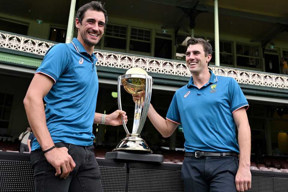 Mitchell Starc and Pat Cummins are reunited with the World Cup Trophy at the SCG