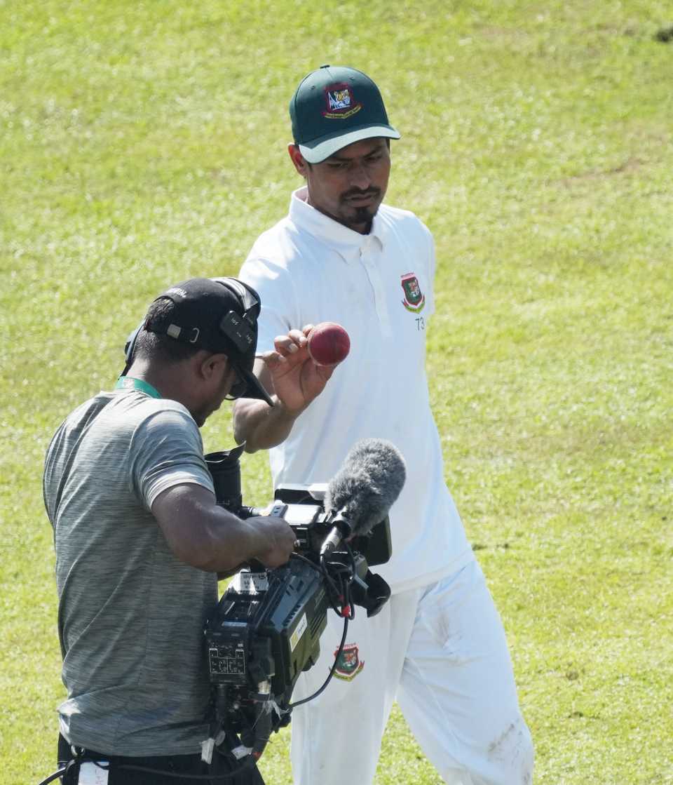 Taijul Islam shows off his souvenir to the camera after taking a six-for, Bangladesh vs New Zealand, 1st Test, fifth day, Sylhet, December 2, 2023