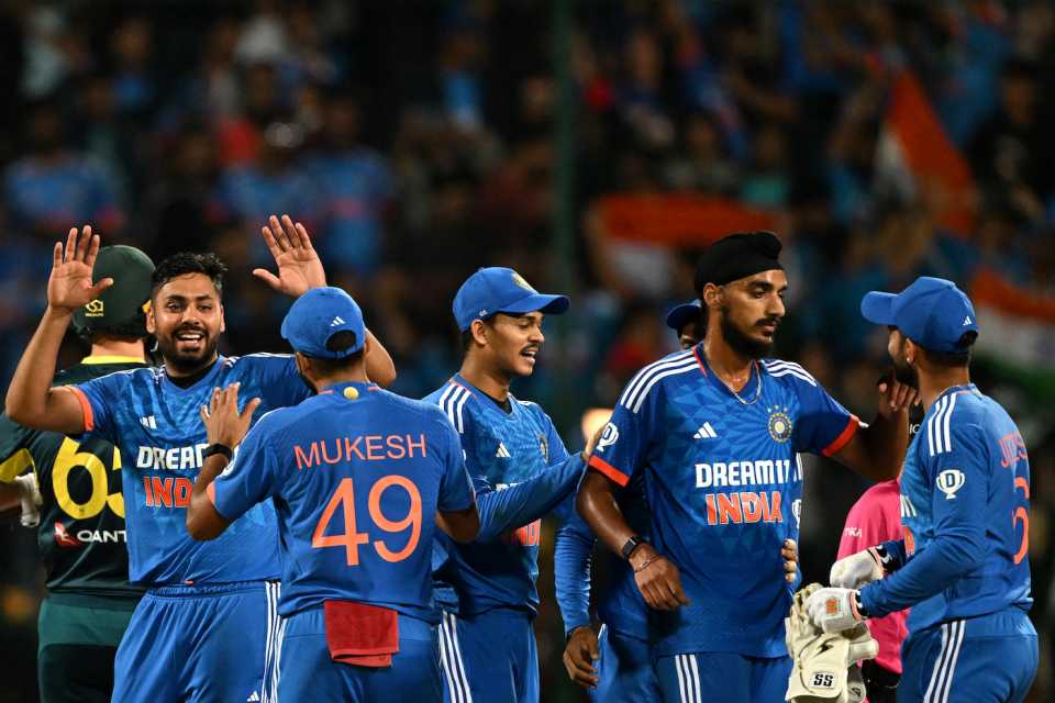 The India players get together to celebrate a hard-fought win
