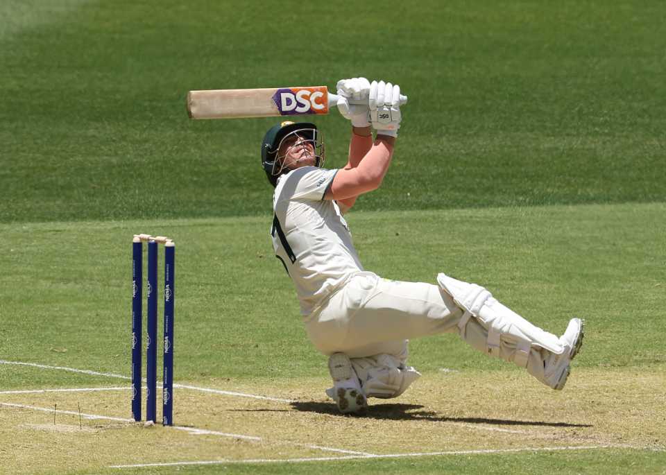 David Warner launches a six over long leg