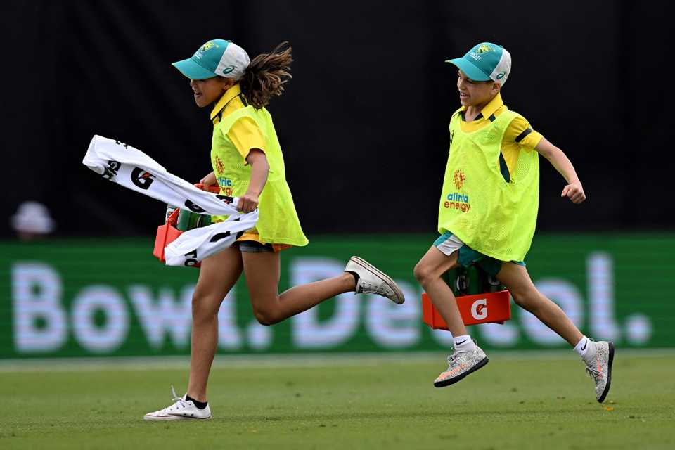 Andrew Symonds' children, Chloe and Will, run drinks during the match, Australia vs Zimbabwe, 1st ODI, Townsville, August 28, 2022