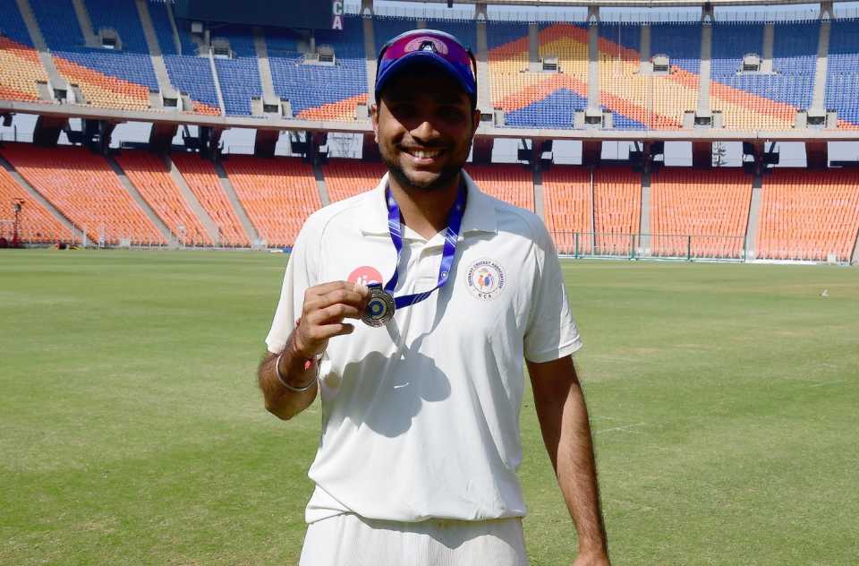 Siddharth Desai shows off his Player-of-the-Match medal, Gujarat vs Karnataka, Ranji Trophy, 4th day, Ahmedabad, January 15, 2024