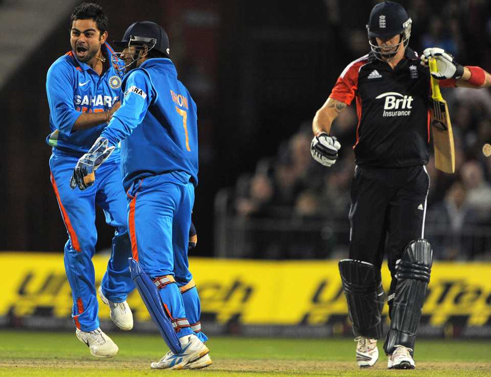 Virat Kohli and MS Dhoni celebrate stumping Kevin Pietersen, England v India, Twenty20, Old Trafford, August 31, 2011
