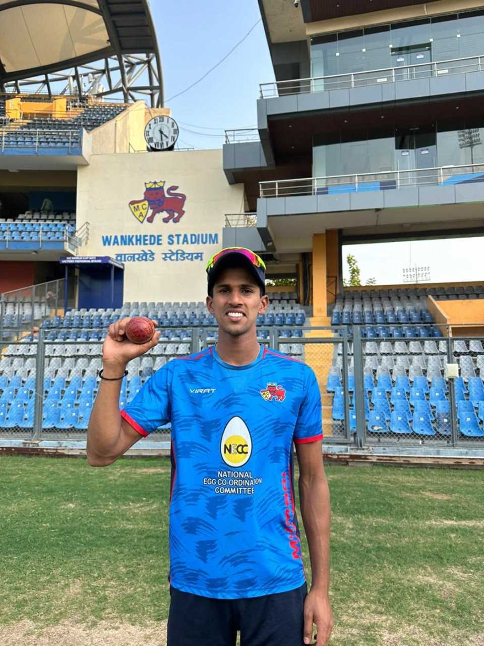 Tanush Kotian poses with the signed match ball after his five-for in the second innings, Mumbai vs UP, Ranji Trophy 2023-24, Day 4, Mumbai, January 29, 2024