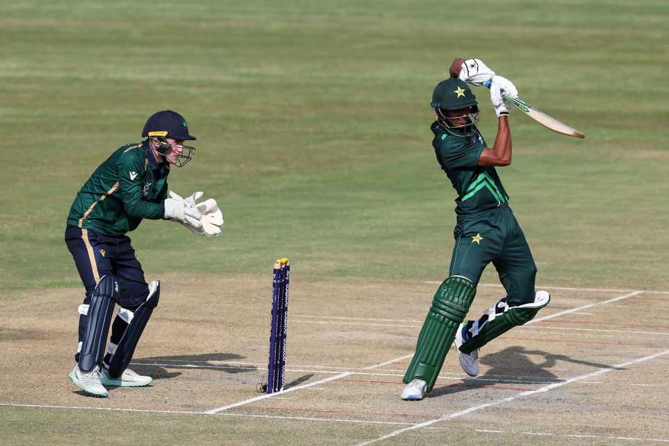 Ahmad Hassan punches one off the back foot as Ryan Hunter looks on, Ireland vs Pakistan, Potchefstroom, Super Sixes, Under-19 Men's World Cup, January 30, 2024
