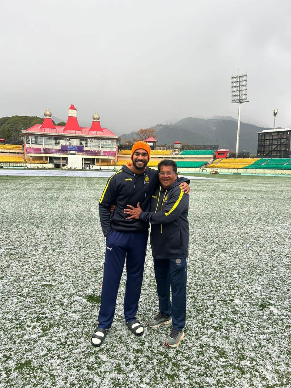 Venkatesh Iyer and Madhya Pradesh coach Chandrakant Pandit at the snow-clad HPCA Stadium, Dharamsala, February 1, 2024