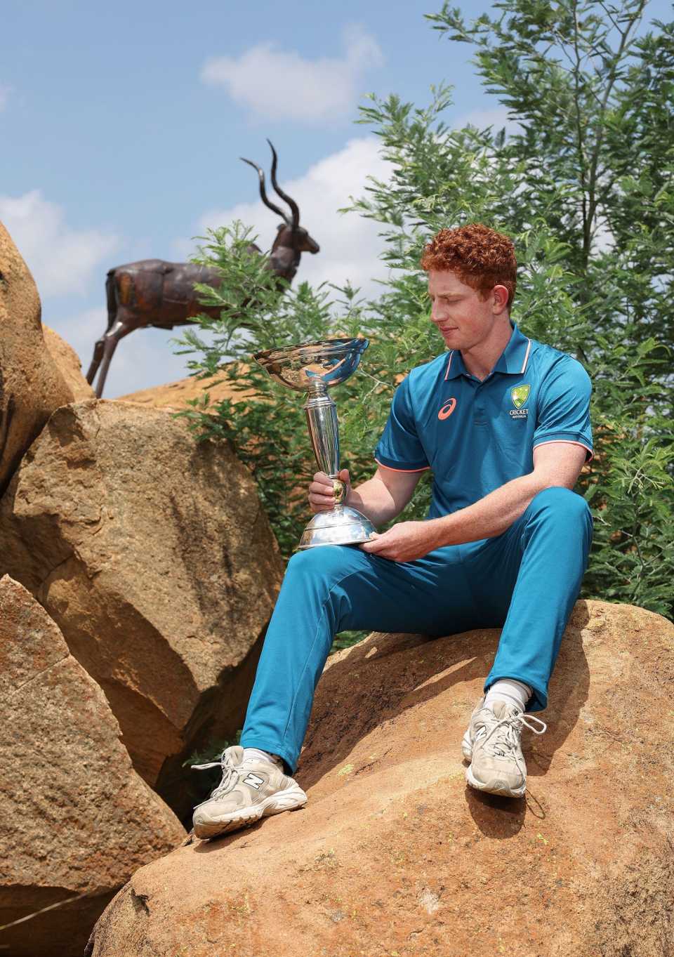 Australia Under-19 World Cup-winning captain Hugh Weibgen has a close look at his coveted prize