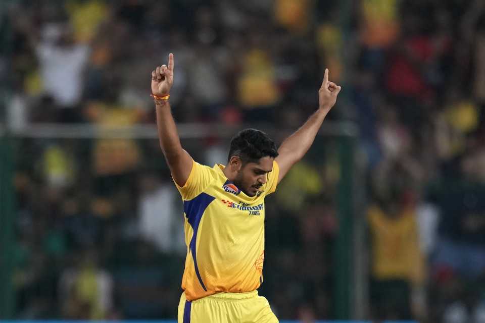 Tushar Deshpande celebrates a wicket