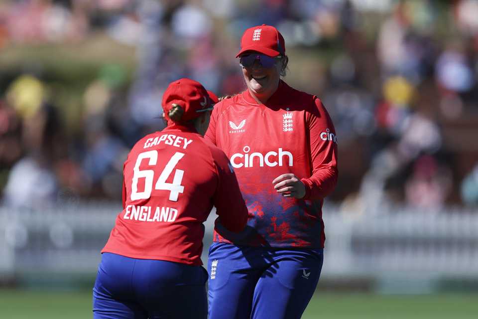 Sophie Ecclestone celebrates a wicket with Alice Capsey