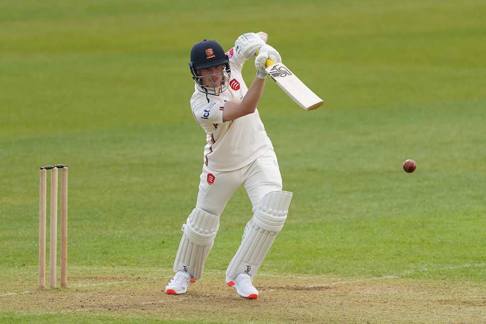 Jordan Cox punches a drive on Essex debut