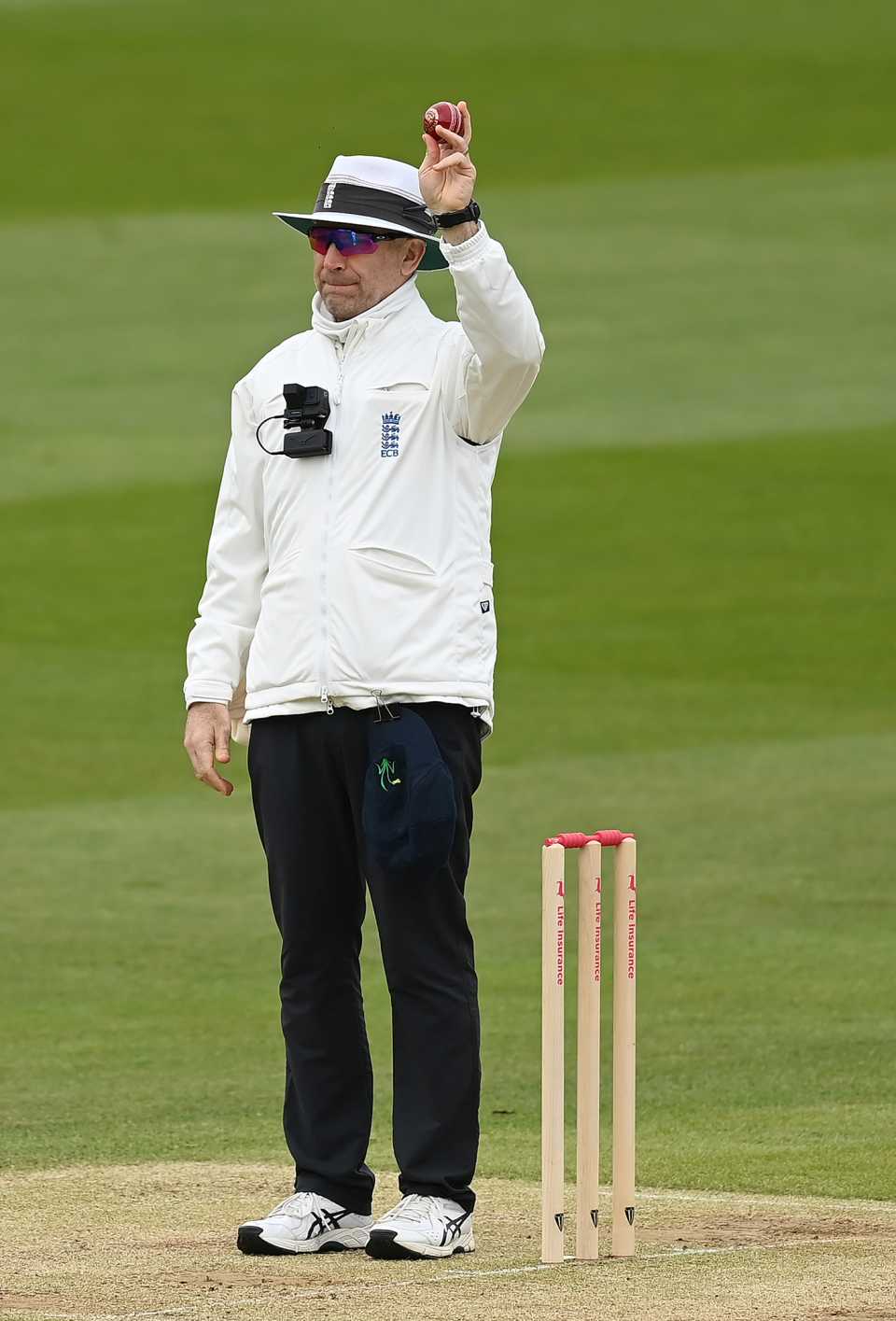 James Middlebrook holds up the new Kookaburra ball after 80 overs, Middlesex vs Glamorgan, County Championship, Division Two, April 8, 2024