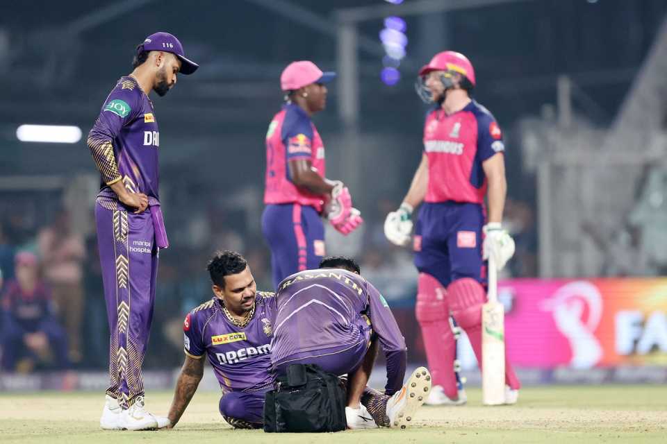 Sunil Narine gets tended to by the physio