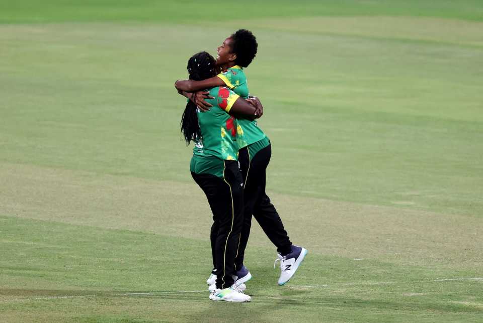 Vanessa Vira of Vanuatu celebrates a wicket