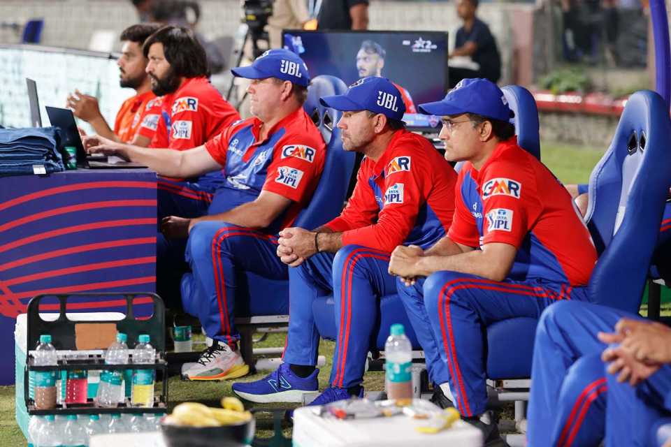 Ricky Ponting and Sourav Ganguly watch from the dugout