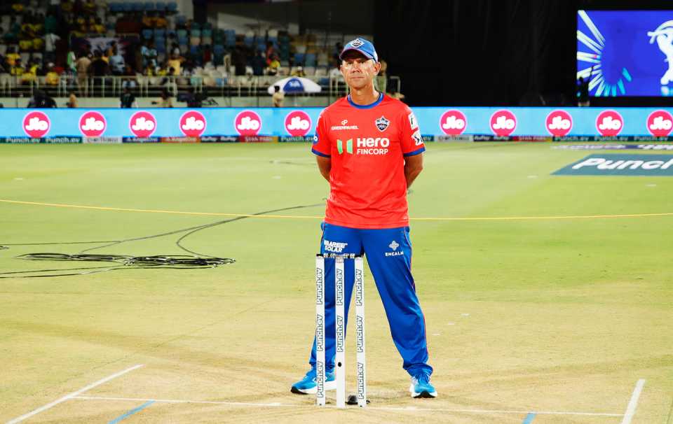 Delhi Capitals head coach Ricky Ponting stands behind the stumps