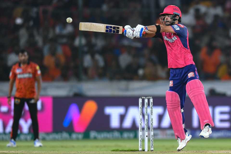 Riyan Parag leaps and reaches out to belt the ball, Sunrisers Hyderabad vs Rajasthan Royals, IPL 2024, Hyderabad, May 2, 2024