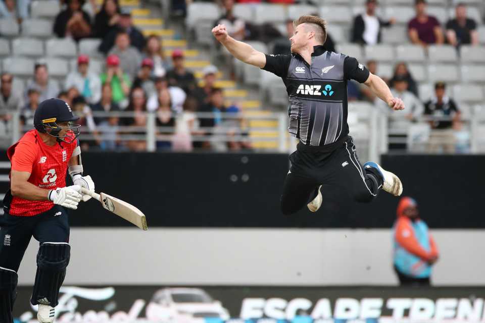 Jimmy Neesham jumps for the ball, New Zealand v England, 5th T20I, Auckland, November 11, 2019