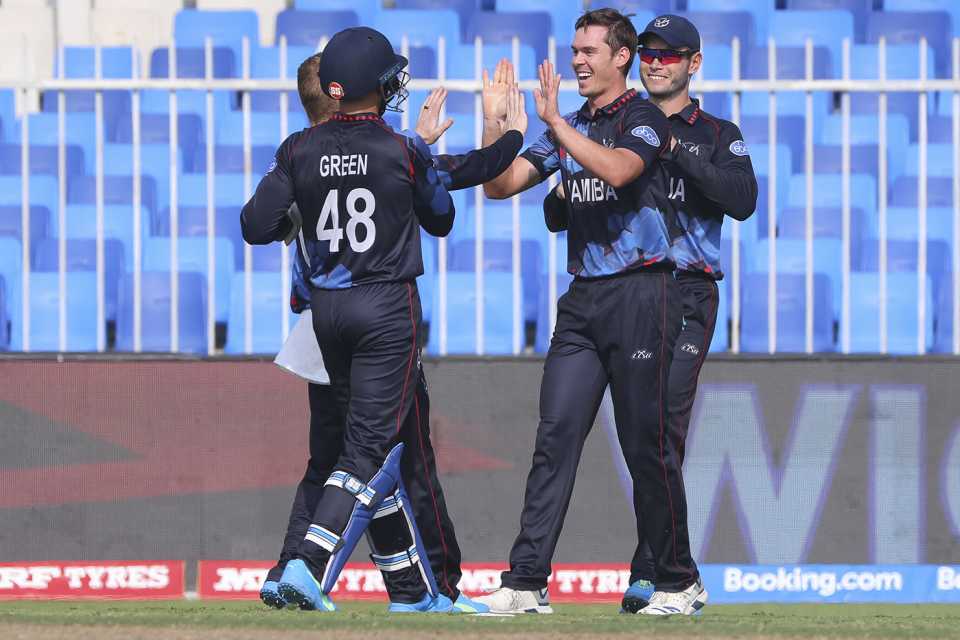 Michael van Lingen celebrates with his team-mates after taking a catch, Namibia vs New Zealand, T20 World Cup, Group 2, Sharjah, November 5, 2021