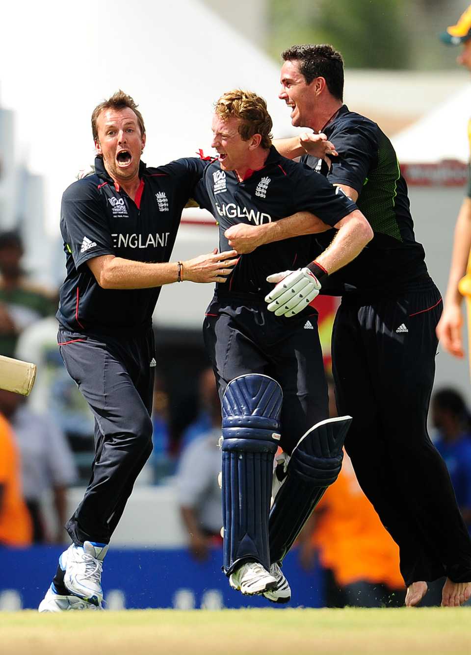 Graeme Swann and Kevin Pietersen mob Paul Collingwood after England's World T20 victory in 2010, Barbados, May 16, 2010