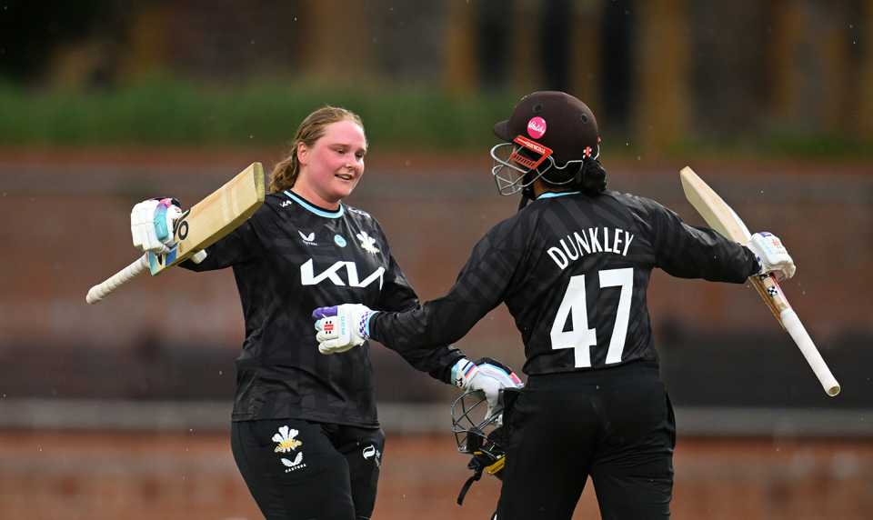 Bryony Smith celebrates her century with team-mate Sophia Dunkley, Metro Bank One Day Cup, Somerset vs Surrey, Taunton, May 11, 2025