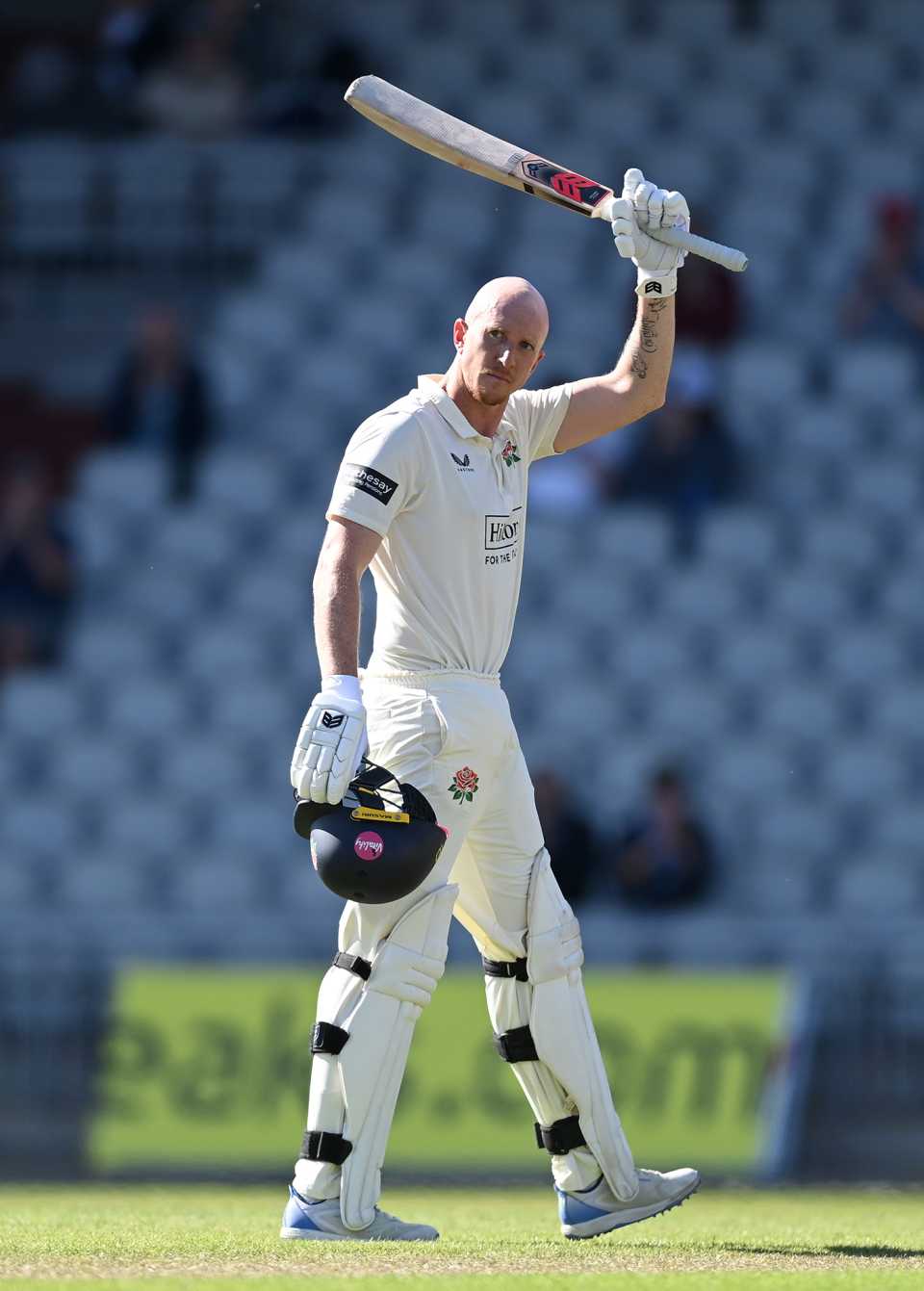 Luke Wells raises his bat on reaching three figures, Lancashire vs Derbyshire, County Championship, Division Two, Old Trafford, May 16, 2025
