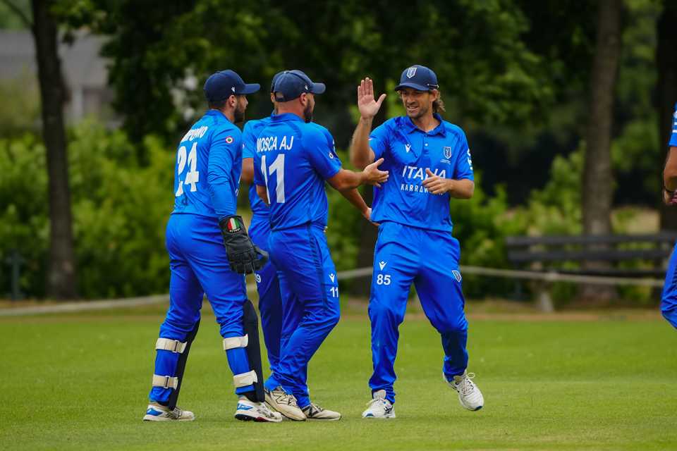 Joe Burns celebrates a wicket with his Italy team-mates, Italy vs Netherlands, ICC Men's T20 World Cup Europe Region Final, The Hague, July 11, 2025