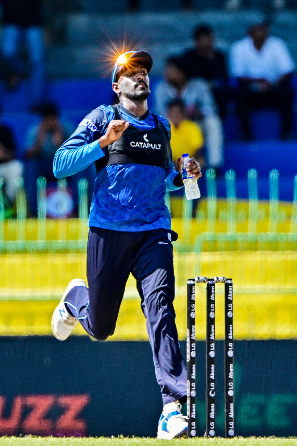 The light catches Milan Rathnayake as he runs on the field, Sri Lanka vs Bangladesh, 1st ODI, Colombo (RPS), July 2, 2025