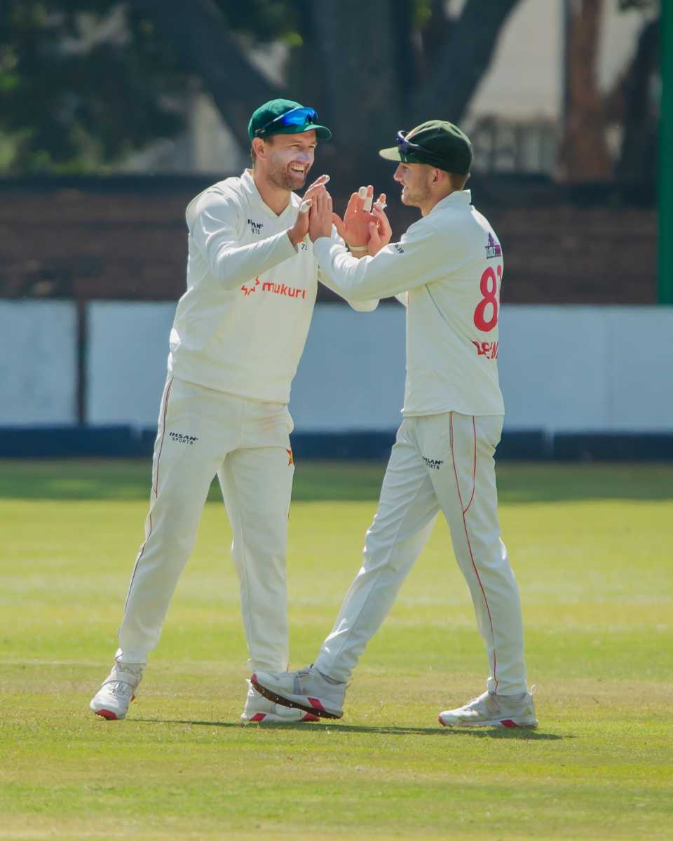 Craig Ervine and Brian Bennett are all smiles after the dismissal of nightwatcher Jacob Duffy, Zimbabwe vs New Zealand, 2nd Test, Bulawayo, 2nd day, August 8, 2025