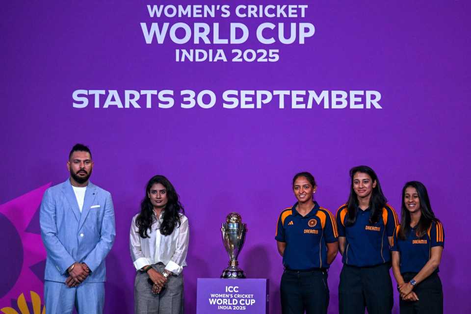 Yuvraj Singh, Mithali, Harmanpreet Kaur, Smriti Mandhana and Jemimah Rodrigues pose with the ODI World Cup trophy, Mumbai, August 11, 2025