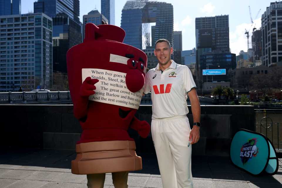 Scott Boland poses with an Ashes mascot in Melbourne