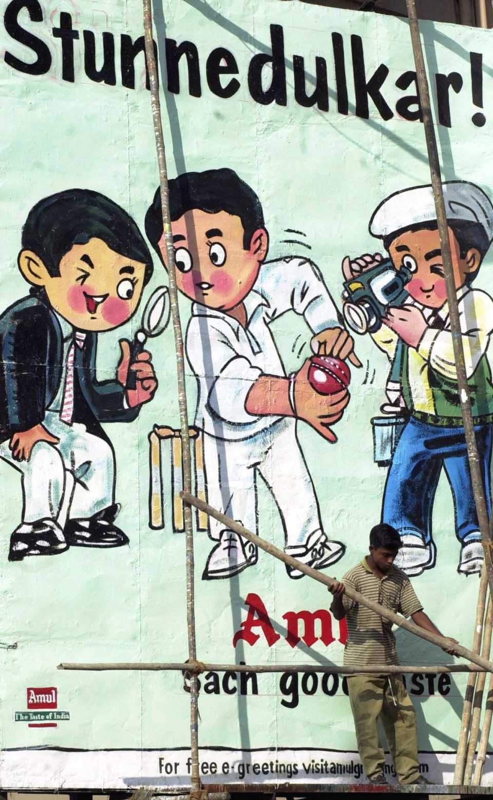 An advertising billboard in Mumbai refers to Sachin Tendulkar's suspension by umpire Mike Denness, November 23, 2001