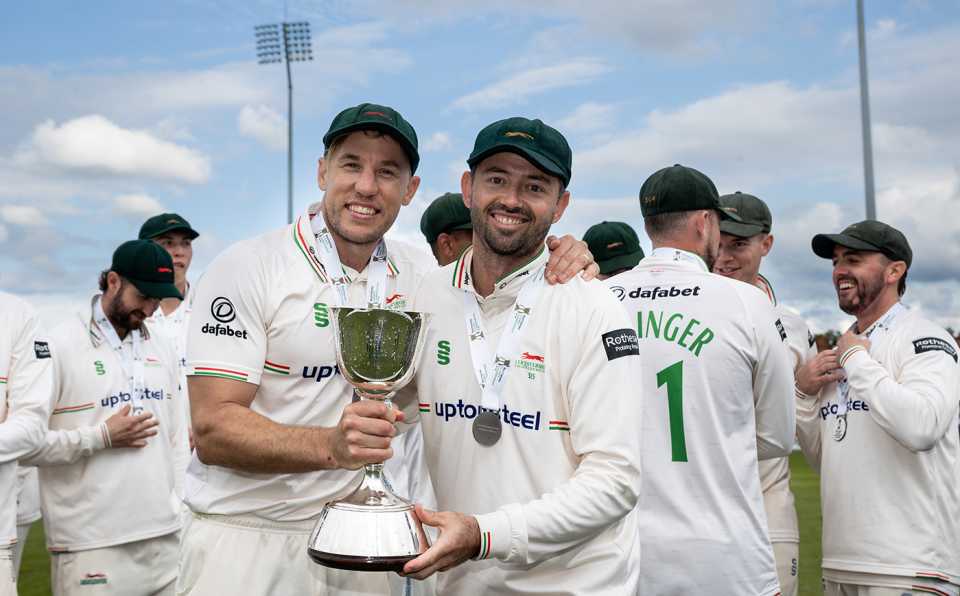 Logan van Beek and Leicestershire captain Ian Holland pose with the trophy, Northamptonshire vs Leicestershire, County Championship, Wantage Road, September 27, 2025
