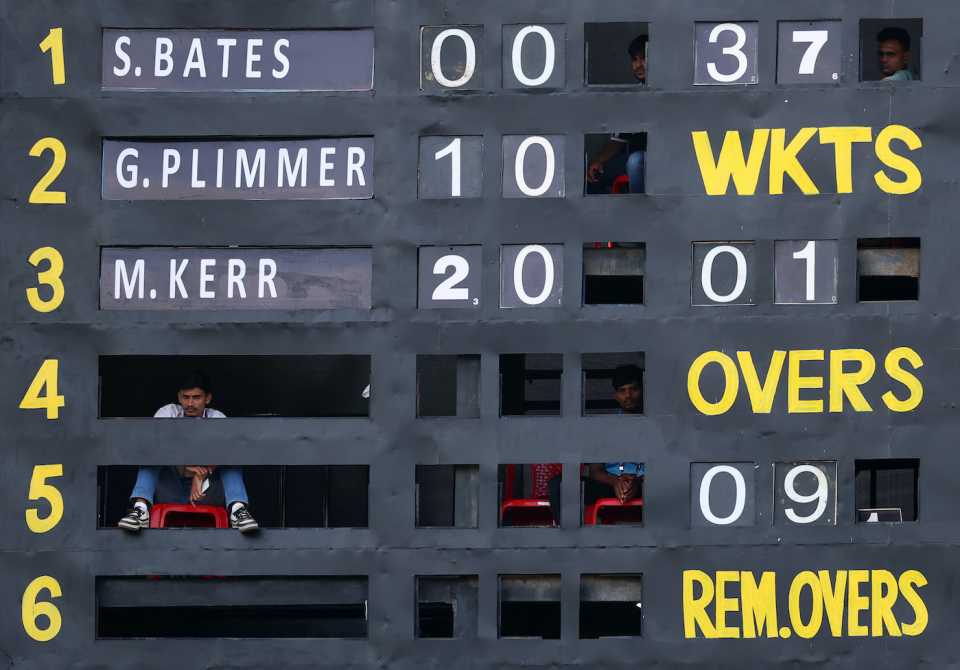 A scoreboard operator is ready to follow Amelia Kerr at No. 4, New Zealand vs South Africa, Women's ODI World Cup, Indore, October 6, 2025