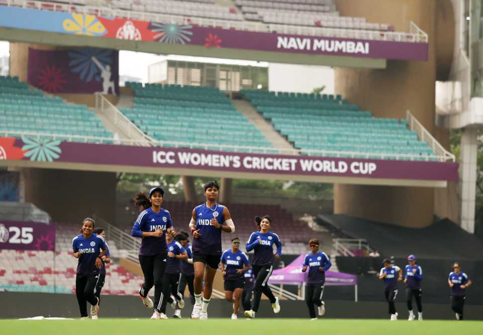 The India team runs around the ground during practice, Navi Mumbai, October 21, 2025