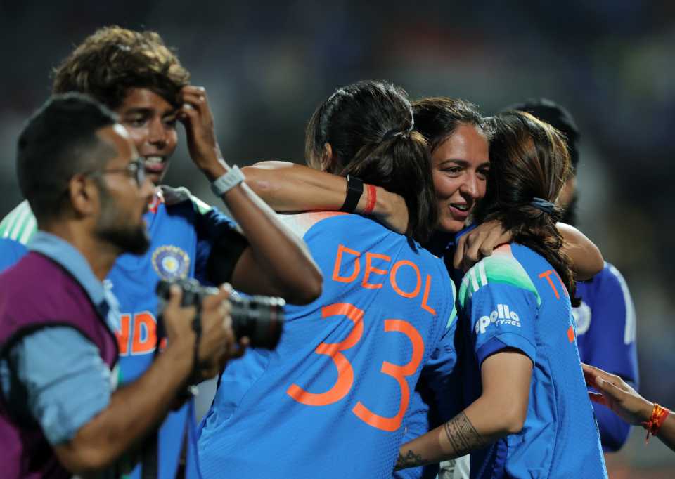 An emotional Harmanpreet Kaur is engulfed by her team-mates, India vs Australia, Women's World Cup semi-final, Navi Mumbai, October 30, 2025