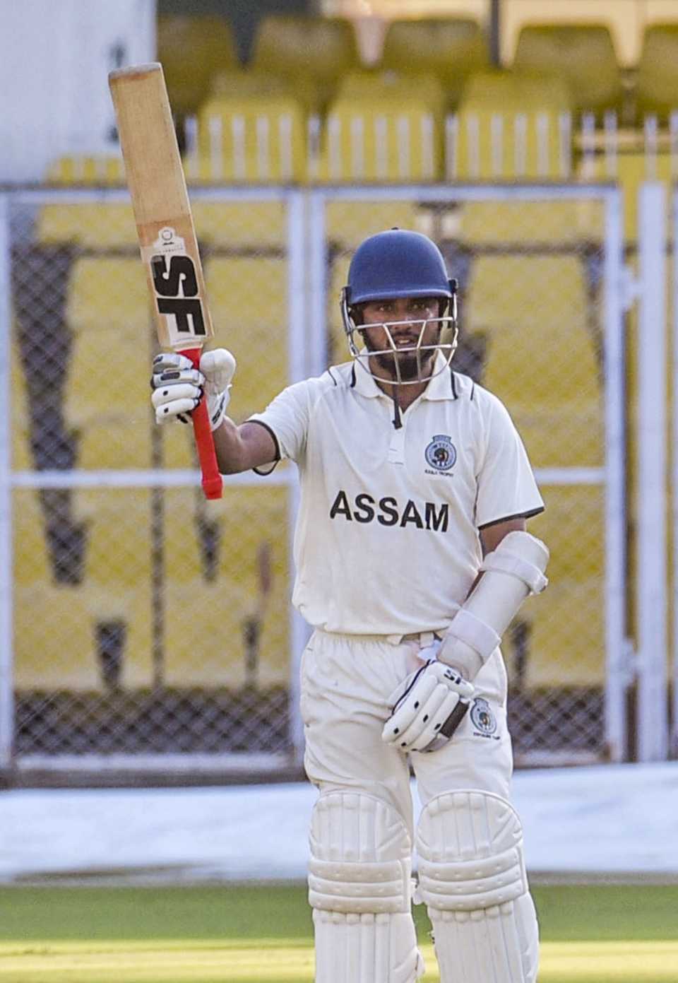Swarupam Purkayastha raises his bat after getting to a half-century, Assam vs Railways, Ranji Trophy 2025-26, 3rd day, Guwahati, November 3, 2025