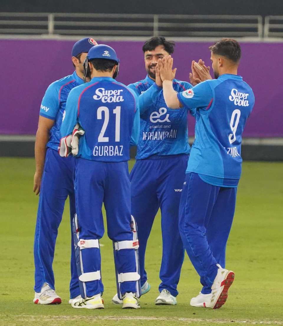 Rashid Khan celebrates a wicket with his team-mates, Afghanistan vs West Indies, 1st T20I, Dubai, January 19, 2026