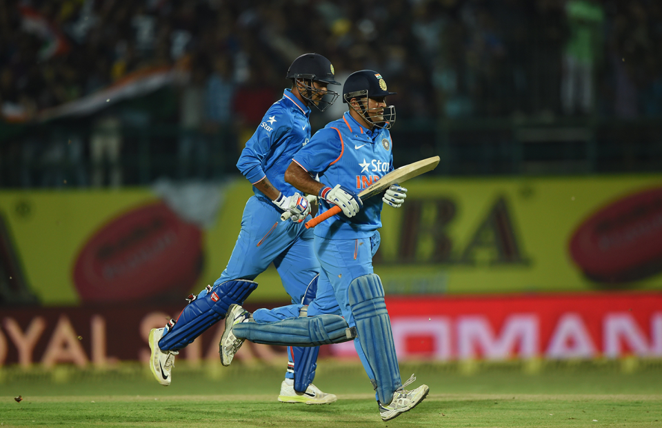 Axar Patel and MS Dhoni leave the field, India v South Africa, 1st T20, Dharamsala, October 2, 2015