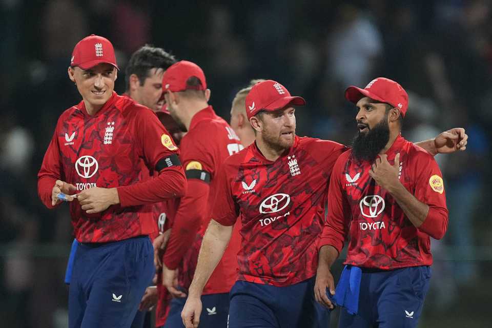 Liam Dawson and Adil Rashid celebrate victory with their England team-mates, Sri Lanka vs England, 3rd T20I, Pallekele, February 3, 2026