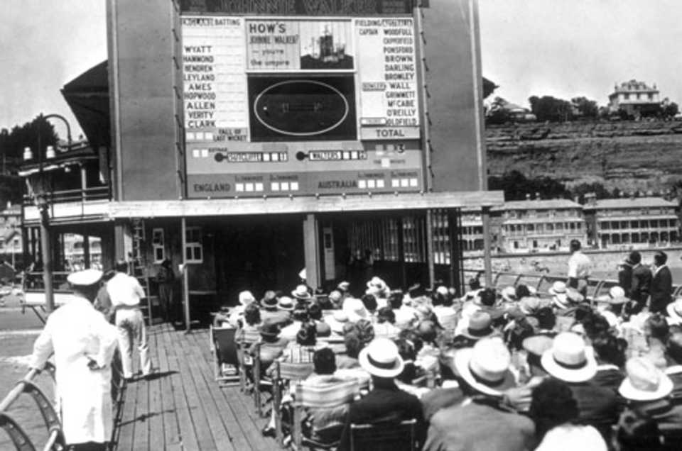 Cricket fans on the Isle of Wight keep in touch with the latest score from the Test match between England and Australia at Old Trafford, July 8, 1934