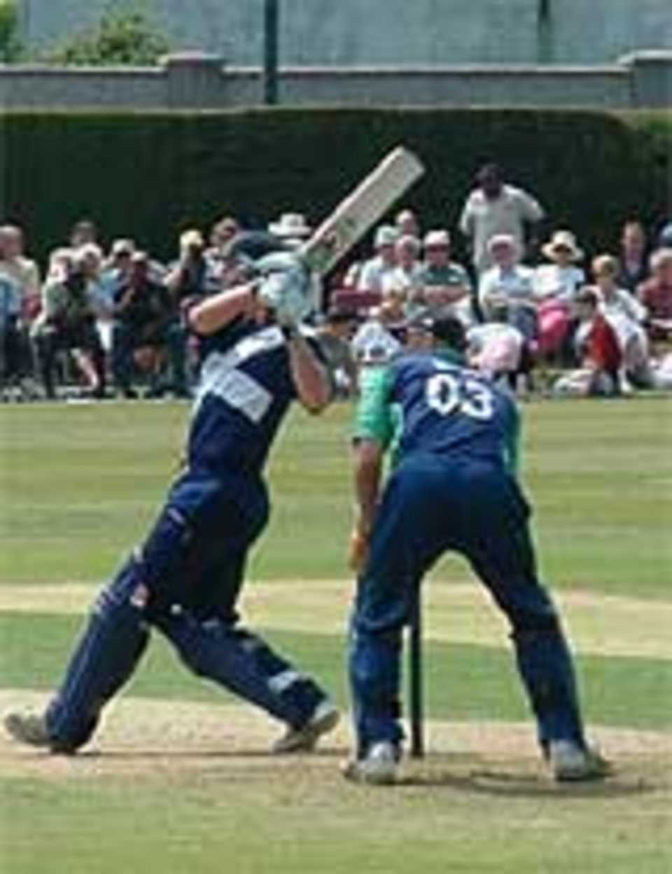 Dougie Brown hits a boundary in his 59