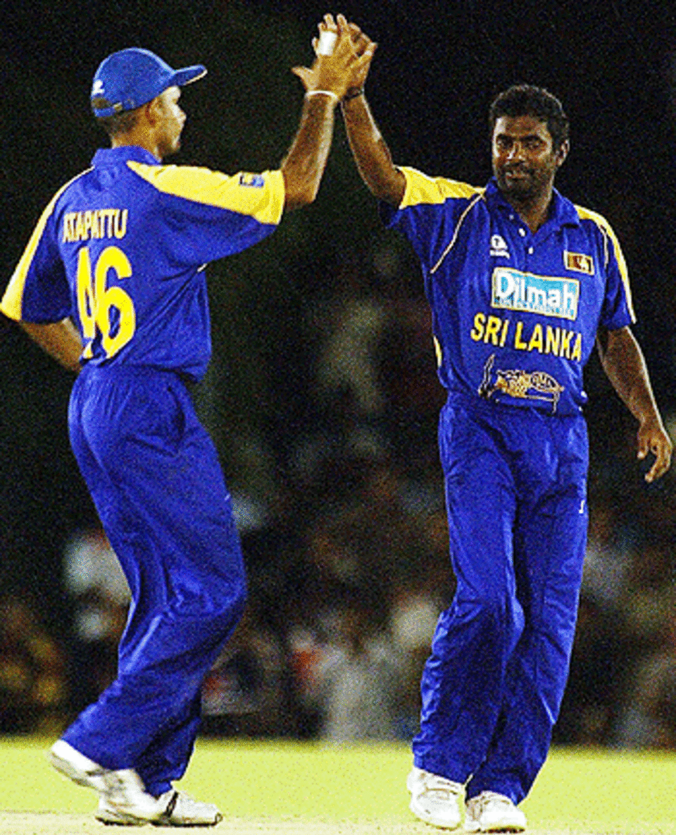 Muttiah Muralitharan celebrates the fall of a wicket against West Indies at Dambulla, August 2, 2005