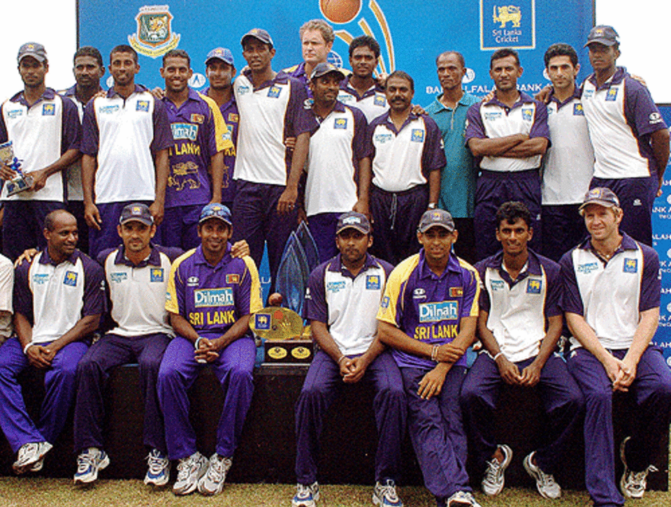 The victorious Sri Lankan team pose after beating Bangladesh 3-0