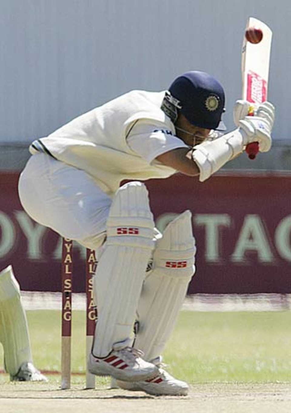 Sourav Ganguly's bat pokes out dangerously as he takes evasive action