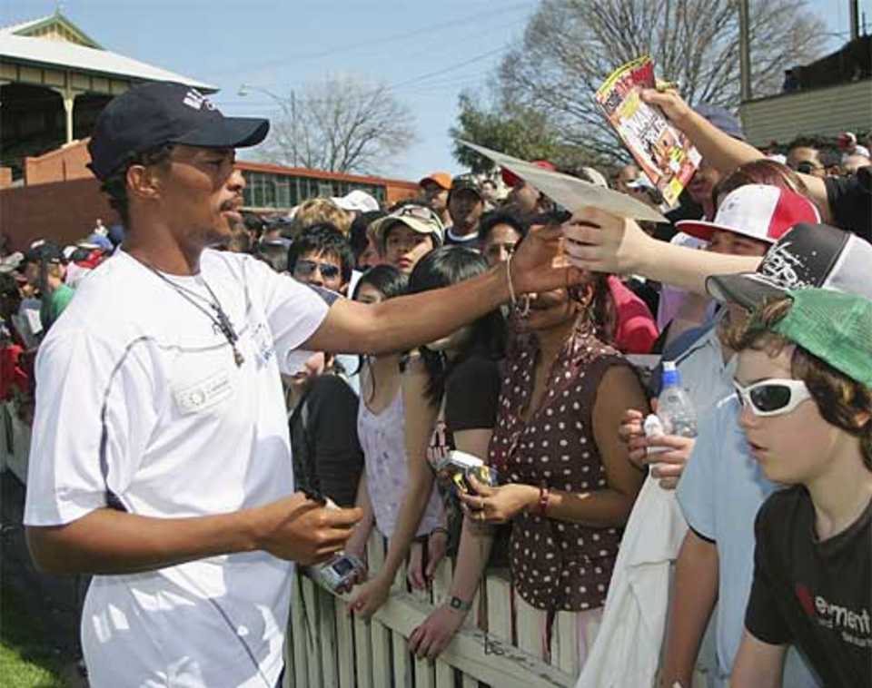 Makhaya Ntini takes time out to sign some autographs, Victoria v World XI, Melbourne, October 2, 2005