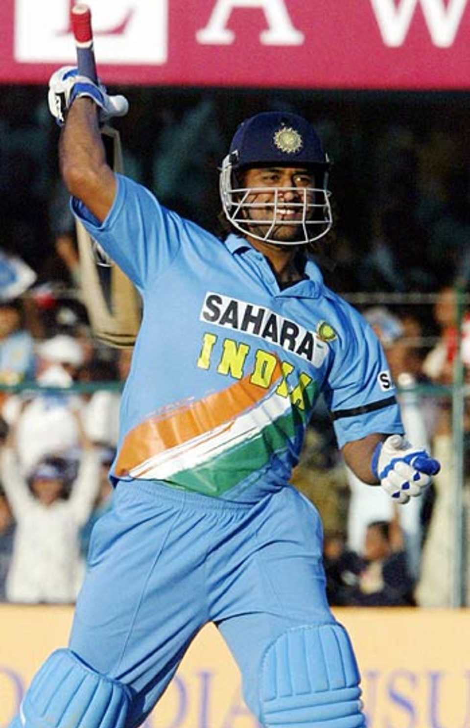 Mahendra Singh Dhoni celebrates after smashing the winning runs, India v Sri Lanka, 3rd ODI, Jaipur, October 31, 2005