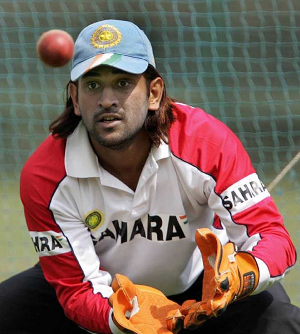 Mahendra Singh Dhoni practises his wicketkeeping ahead of the fourth ODI against Sri Lanka, Nehru Stadium, Pune, November 2, 2005