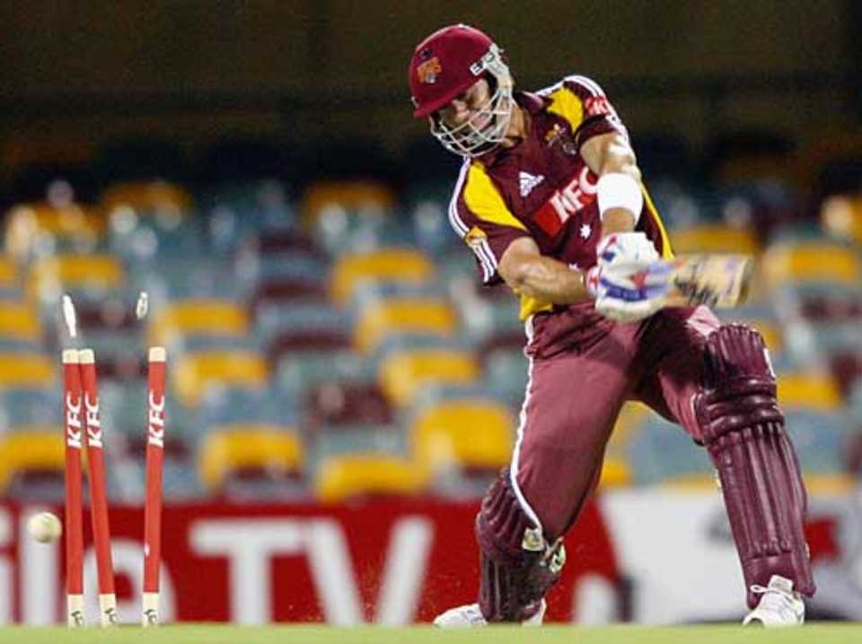 Andy Bichel is bowled by Ben Hilfenhaus for seven, Queensland v Tasmania, Twenty20, Brisbane, January 6, 2006